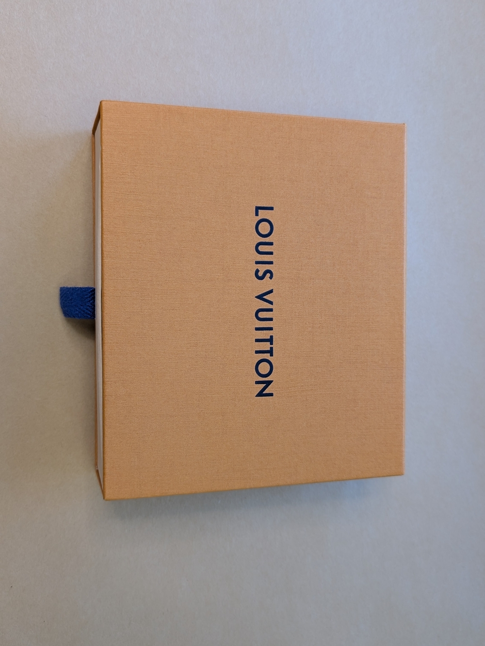 Louis Vuitton Orange Box with Blue Logo Pull